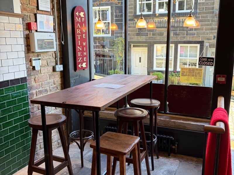 A high table by the front windows